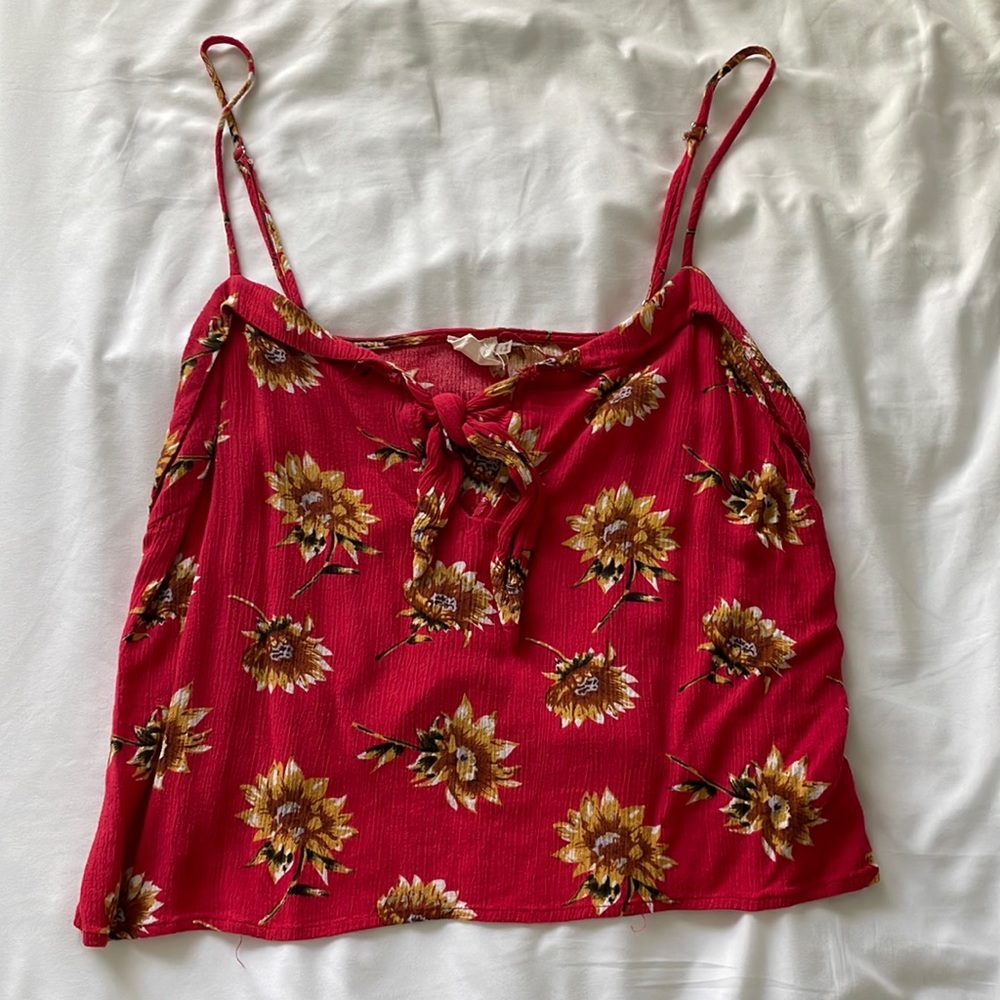 Cropped tank top with sunflowers on it.